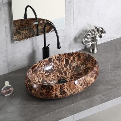 China Art Popular Natural Stone Basin Bathroom Sinks Ceramic Oval Marble Hotel No Hole Vanity Wash Bath Ceramic Stone Sink for sale