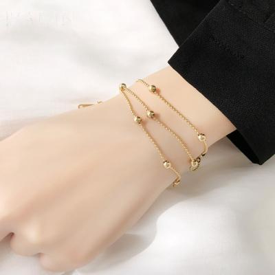 China Fashionable Lead Free Nickel Free PVD Plating Stainless Steel 3 Layered Beaded Chain Balls Charms Bracelets For Women for sale