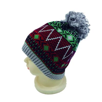 中国 2021 Wholesale Acrylic Jacquard Style Custom Pom Pom Knitted Hat Winter Warm Hats 販売のため