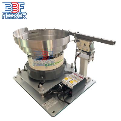 China Adjustable Speed Vibrating Bowl Feeder Crown Lids Cap Feeder Machine for sale