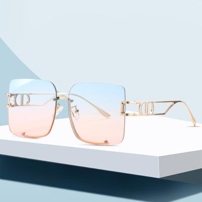 China Fashion Sunglasses Shape Ocean Color Eyewear Fashionable Customized Gradient Color Shade Rimless Women Sunglasses Newest 2021 for sale