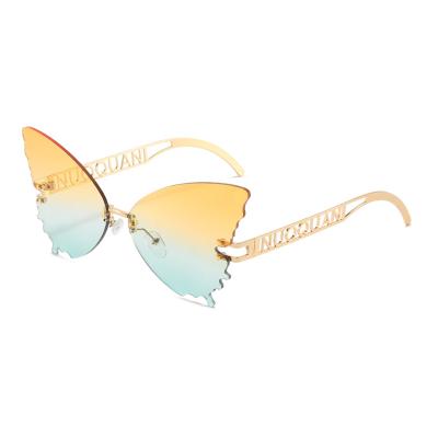 China New designer designer sunglasses fashion butterfly frame chic-rimless gradient stylish sun shading glasses for woman for sale