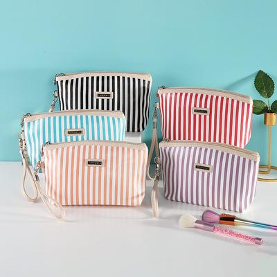 China Durable Customized Colorful Stripe PU Cosmetic Bag Makeup Bag Designer Cosmetic Bags for sale