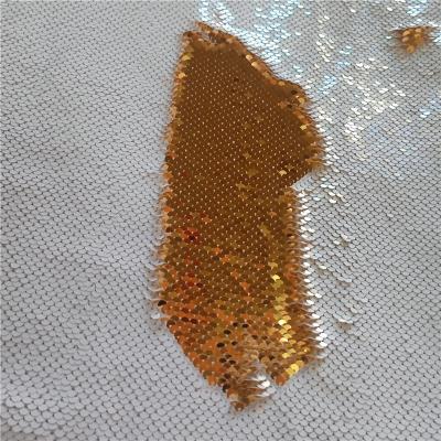 China Water Resistant Popular Reversible Gold Sublimation 5mm Empty Sequin Fabric for sale