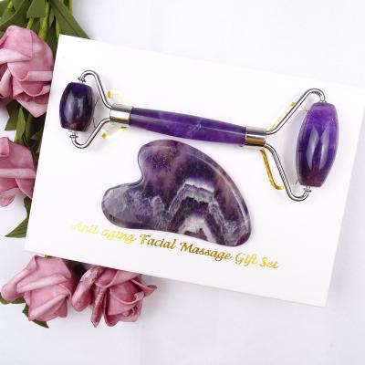 China Luxury Face New Year Gift Beauty Set Purple Amethyst Jade Roller Face Roller Gua Sha Tool for sale