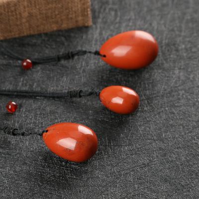 China Natural Red Jasper Yoni Body Massage Stone 100% Jade Yoni Eggs for sale