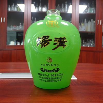 China Beverage Round Flint Glass 1L Wine Bottle Super Mineral Flavors Bottle for sale