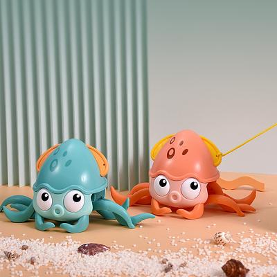 China Bath Toy 2021 Hot Summer Water Pull Amphibious Wind Toys Octopus Bath Walking Toys For Children for sale