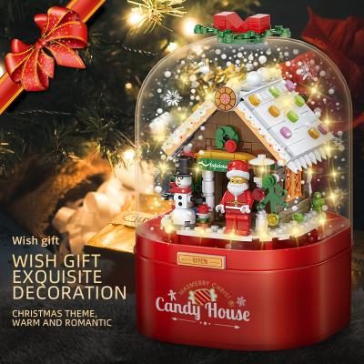 China Creative Christmas Santa Claus Elk Snow House Gift Auto Snow Christmas Tree Gift DIY Building Block The Music Box for sale