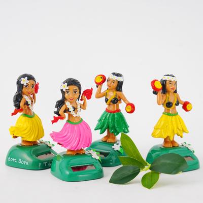 China Polynesian Dance Girl Resin Polynesian Dance Girl Hot Sale Hawaiian Figurine Powered Shake Head Solar Toy for sale