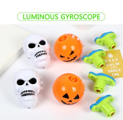 China Glowing Lights Halloween Pumpkin Skull Music Top Toy for sale