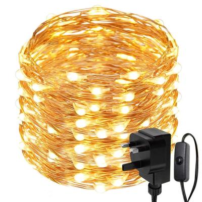 China Fairy Lights String UK Plug 20m 200LED DC12v Power Adapter Copper Wire String Starry Fairy Light with One Switch for sale