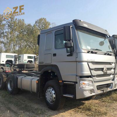 China Brand New Cloth Sinotruck Howo Tractor 6x4 Truck Head For Sale for sale