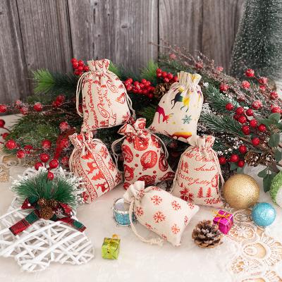 China Cheap Christmas Eco-Friendly Promotional Drawstring Bag Santa Claus Jute Linen Pouch Cute Mini Drawstring Gift Candy Bag Xmas Gift Bag for sale