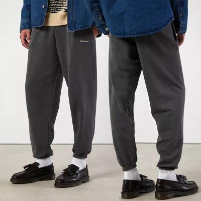 China Anti-Wrinkle Mens Joggers Pants Zipper Pockets Casual Mens Trousers Cotton Jogging Sweatpants for sale