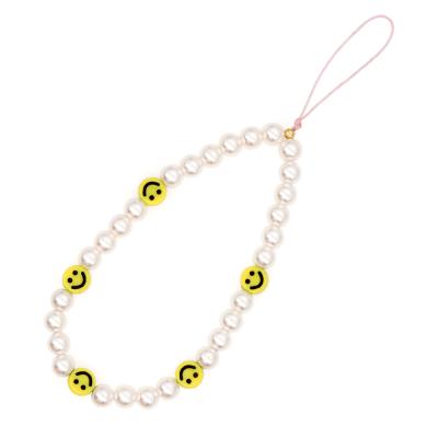 China 2021 New Pottery Soft Pottery Smiling Face Bead Beaded Cell Phone Short Lanyard Female Anti-lost Chain for sale