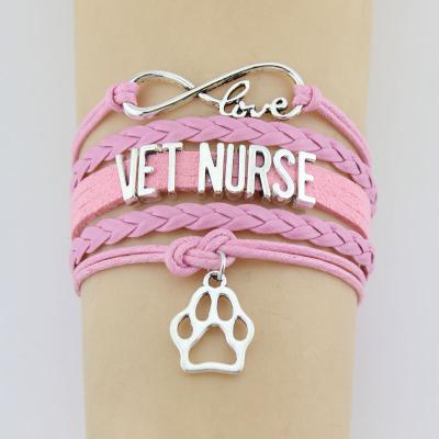 China CLASSIC Charm Bracelet Paw Charm Bracelets High Quality Infinity Love Leather Vet Nurse For Women Men Gift for sale