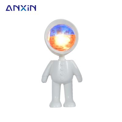 China Children Gift Post-modern Creative Desktop Bedside Led Night Light Usb Rechargeable Astronaut Sunset Projection Lamp for sale