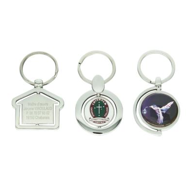 China New Durable Promotional Custom White Home Gift Key Ring Rotating House Engraving Key Chain With Logo for sale