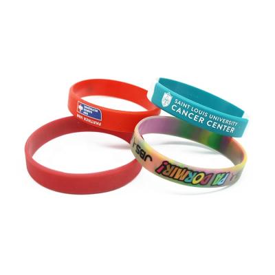 China Promotional Decoration Fashion Letter Carving Printing Wristband Sport Silicone Wristband For Adult for sale