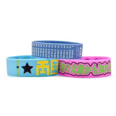 China Wholesale custom embossed bracelet personalized good quality decoration logo rainbow silicone wristband for sale