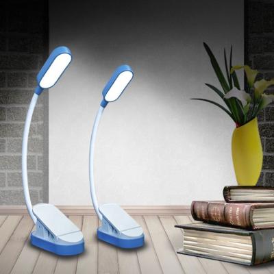 China Modern Whole Sale LED Book Light 3 Light Color Button Switch Shine Dimming Reading Lamp USB Rechargeable With Clamp for sale