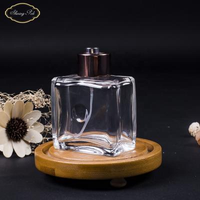 China Personal Care 100ml Rectangle Unique Perfume Bottle OEM Glass Empty High Quality Transparent Perfume Bottle for sale