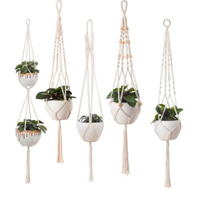 China Handmade American Style Macrame Plant Hanger Flower Pot Hanging Hanger for Wall Decor Garden Home Decoration for sale