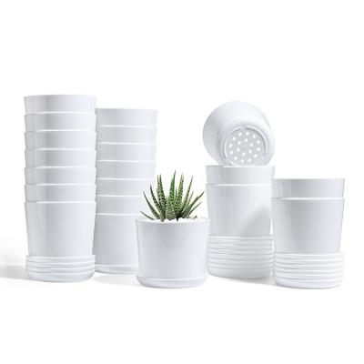 China Modern Promotional Items Plastic Planters With Trays Plastic Pot Planter For Plants Growing Plastic Planter Pot for sale