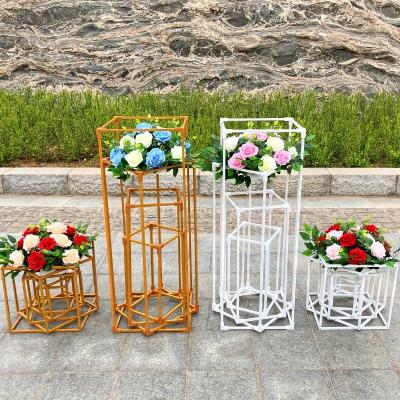 China Hotel .restaurant .banquet. Home.Wedding geometric wedding road present new props iron frame hotel amphitheater showpiece decoration T stage flower stand for sale