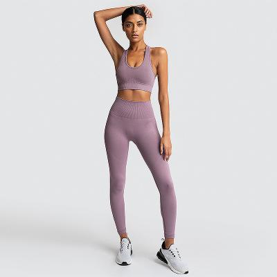 China Breathable Simple American Seamless Sports Vest Two Sets Knit Yoga Large Size Women's Hip Pants Fitness Suit for sale