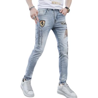 China Breathable European station spring and summer new brand jeans men's Bull ironed diamond embroidery trend slim pants men for sale