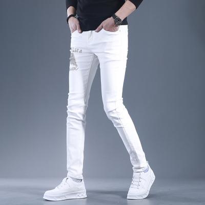 China Men's Slim Pants Breathable White Men's Jeans Stretch New Casual Pants Men's Summer Lightly for sale