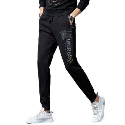 China Anti-wrinkle customized embroidered men's casual pants 2021 fall/winter link foot trend sports pants thin trousers for sale