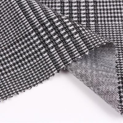 China Plaid Shrink-Resistant Yarn Dyed Fabric High Quality Stretched Knitted Black Plaid Dyed Brocade Jacquard Fabric For Clothes Pants for sale