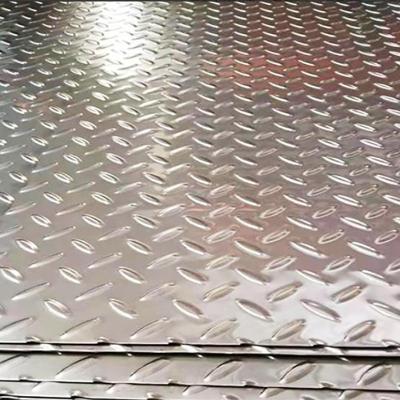 China Industry And Construction Embossed Plate Ss630 409l Diamond Shaped Non-slip Flush Anti-Skateboard Stainless Steel Plate for sale