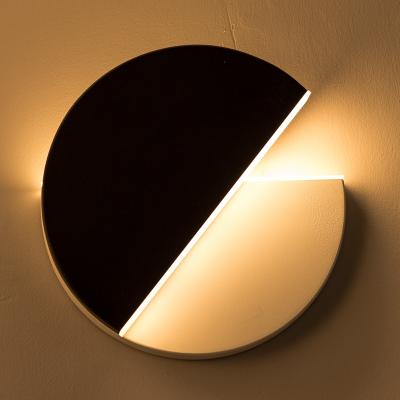 China Creative Nordic Modern Bedside Corridor Bedroom Wall Lamp Living Room Circular Led Rotating Wall Light for sale