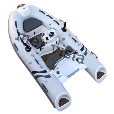 China Speed ​​Racing European Rib 300 Design Small Tender Fiberglass Hull Inflatable Boat With Console for sale