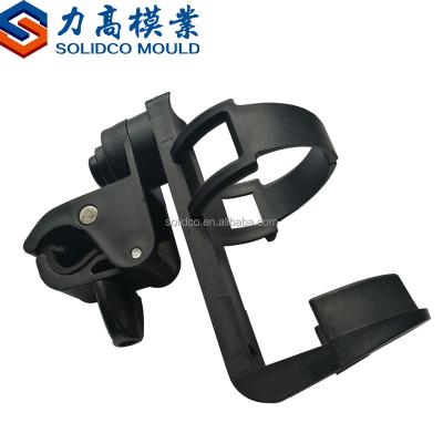 China Good quality carbon black plastic cup holder bicycle mount bottle holder plastic injection molding for sale