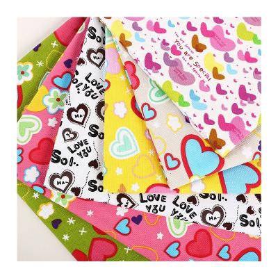 China Blackout Canvas Fabric For Bag Making Thickened Plain Polyester Cotton Printed  Love Cartoon Tablecloth Sofa Picnic Fabric Wholesale for sale