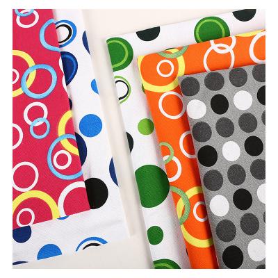 China Stain Resistant Canvas Fabric Thickened Polyester Cotton Printed Dots Fabric DIY Hand Sewn Luggage Tablecloth Sofa Package Cloth for sale