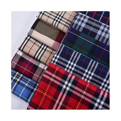 China Tear-Resistant Wholesale JK uniform lattice pleated skirt new stock all polyester color woven college uniform bow tie headwear plaid fabric for sale