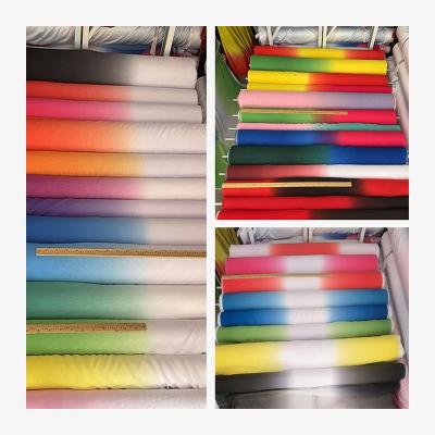 China Tear-Resistant Wholesale of 100D chiffon yarn all polyester gradient color new fashionable clothing scarves stage performance clothing fabrics for sale