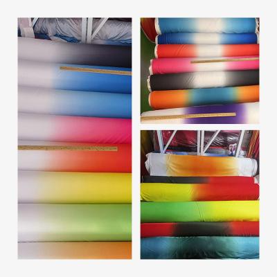 China Tear-Resistant Wholesale of spandex L ycra gradient color new elastic fashion dresses yoga costumes stage performance clothing fabrics for sale