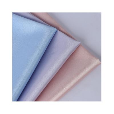 China Tear-Resistant Wholesale 170g crystal twill thick satin colored Ding Bu fashionable dresses baseball suits sportswear casual wear fabrics for sale