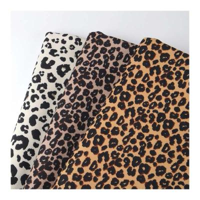 China Shrink-Resistant Wholesale Leopard Pattern Corduroy Fabric Elastic High Quality Polyester Fashion Women's Home Textile Luggage Coat Shirt for sale