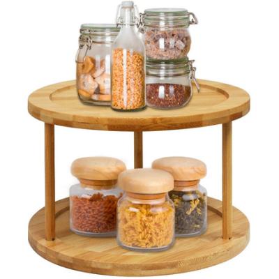 China Sustainable Bamboo Double-Layer Rotating Kitchen Cosmetic Seasoning Storage Matching Rack for sale