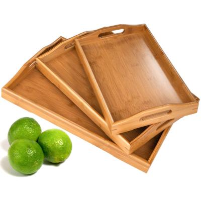 China Large Sustainable 3 Pack Cafe Food Breakfast Bamboo Wooden Dinner Serving Tray Set with Handles for sale