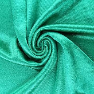 China Dongguan factory supply direct plain shiny nylon spandex stretch stretch satin silk fabric for ladies sleepwear for sale