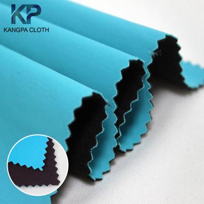 China Anti-Permeable Lycra TPU Composite Film Heat-insulation Polyester Spandex Brush Milk Silk Fabric for sale